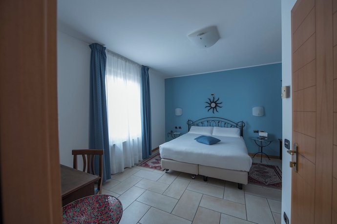Imagen de la habitación del Hotel Villa Colico. Foto 12