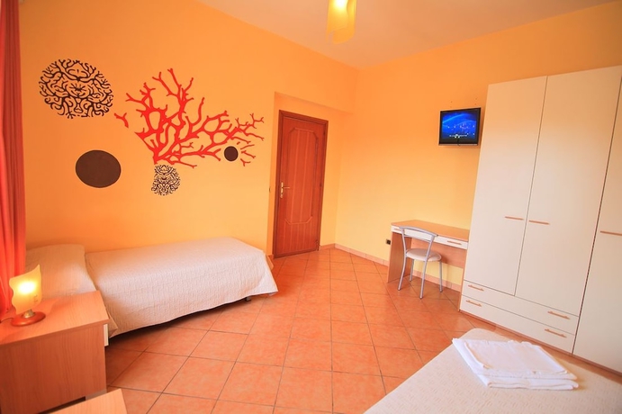 Imagen de la habitación del Hotel Villa Corallina. Foto 4