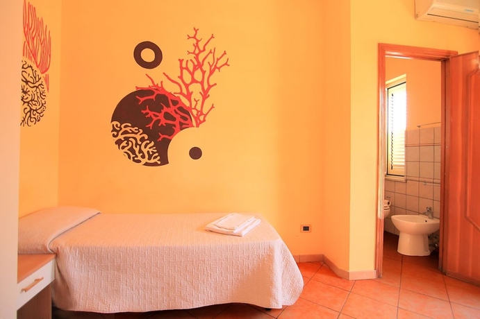 Imagen de la habitación del Hotel Villa Corallina. Foto 7