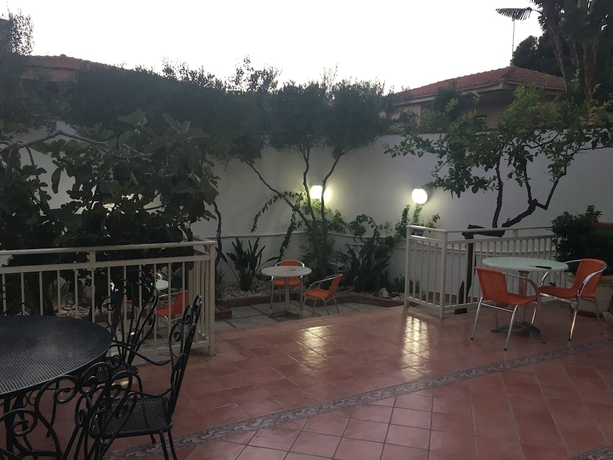 Imagen de la habitación del Hotel Villa Corallina. Foto 10