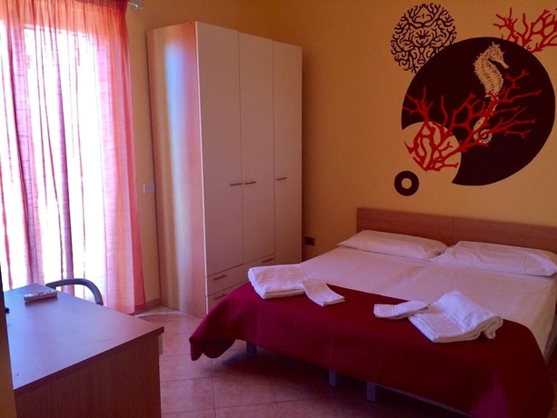 Imagen de la habitación del Hotel Villa Corallina. Foto 11