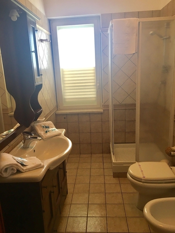 Imagen de la habitación del Hotel Villa Corallina. Foto 13