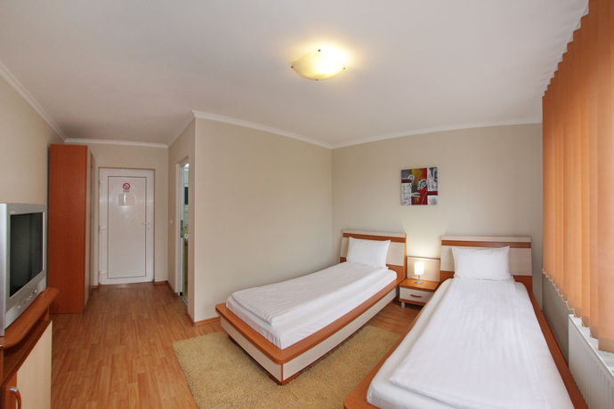 Imagen de la habitación del Hotel Villa Cristian. Foto 4