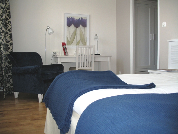 Imagen de la habitación del Hotel Villa Dahlia. Foto 5