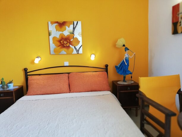 Imagen de la habitación del Hotel Villa Daizy. Foto 12