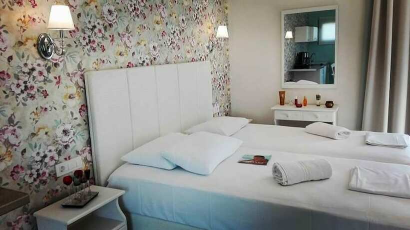 Imagen de la habitación del Hotel Villa Daizy. Foto 16