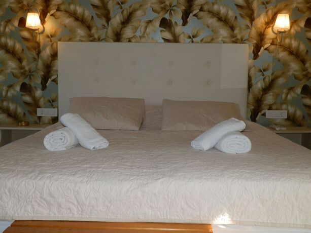 Imagen de la habitación del Hotel Villa Daizy. Foto 20