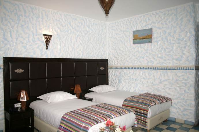 Imagen de la habitación del Hotel Villa Damonte. Foto 14