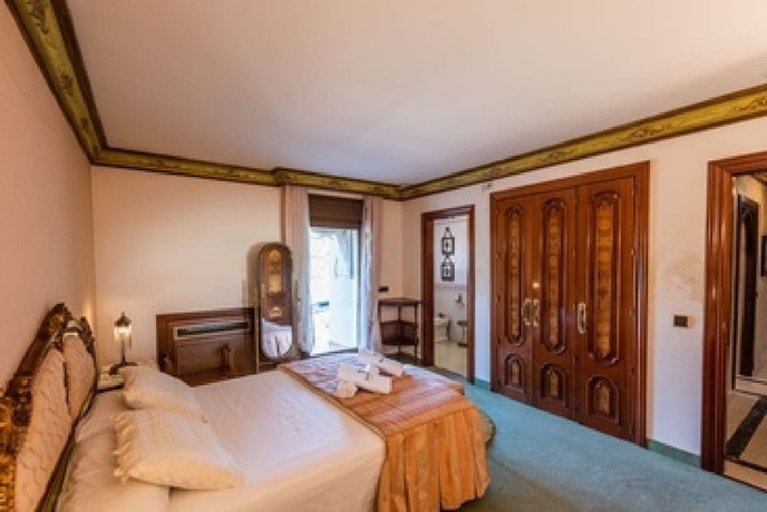 Imagen de la habitación del Hotel Villa Darkum. Foto 13