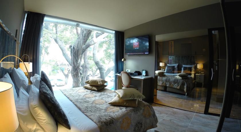 Imagen de la habitación del Hotel Villa Das Mangas Garden. Foto 7