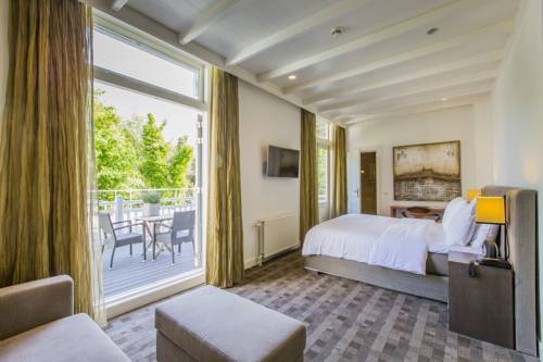 Imagen de la habitación del Hotel Villa De Duinen. Foto 9