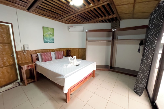 Imagen de la habitación del Hotel Villa De Pico Highland Beach Resort. Foto 4