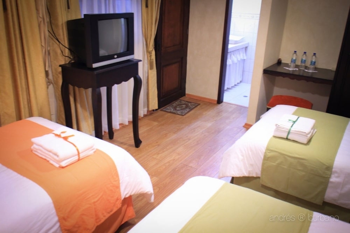 Imagen de la habitación del Hotel Villa De Tacvnga. Foto 8