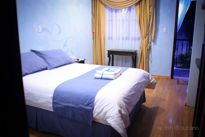 Imagen de la habitación del Hotel Villa De Tacvnga. Foto 13