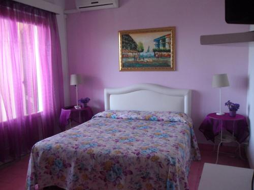 Imagen de la habitación del Hotel Villa Degli Aranci. Foto 7