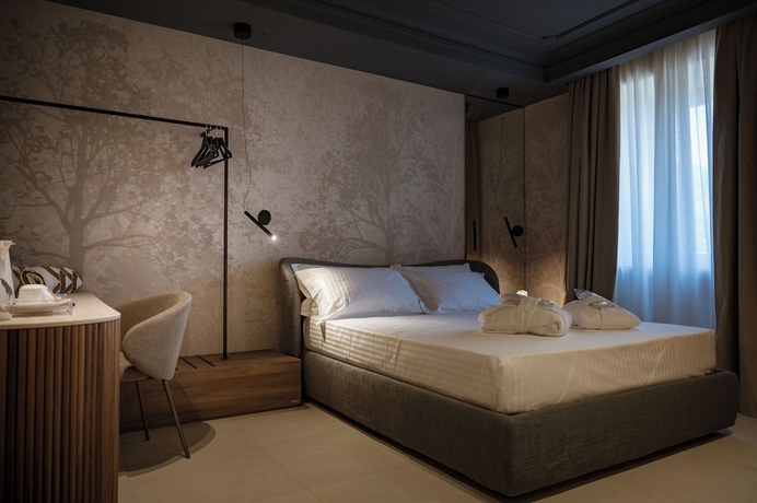 Imagen de la habitación del Hotel Villa Dei Melograni Boutique. Foto 9