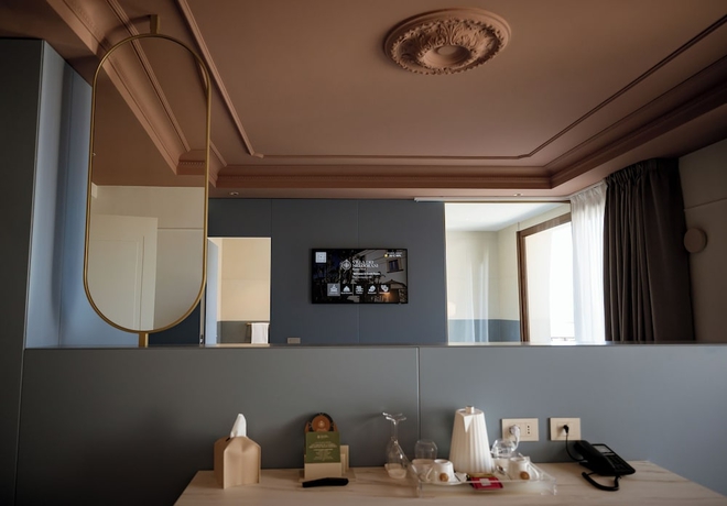 Imagen de la habitación del Hotel Villa Dei Melograni Boutique. Foto 12