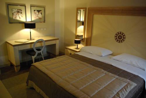 Imagen de la habitación del Hotel Villa Dei Tigli 920 Liberty Resort. Foto 3