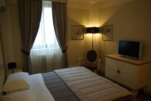 Imagen de la habitación del Hotel Villa Dei Tigli 920 Liberty Resort. Foto 10