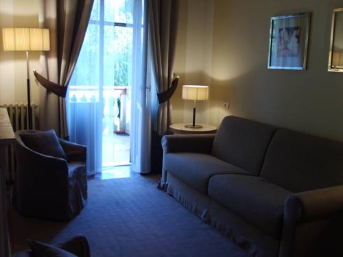 Imagen de la habitación del Hotel Villa Dei Tigli 920 Liberty Resort. Foto 12