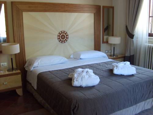 Imagen de la habitación del Hotel Villa Dei Tigli 920 Liberty Resort. Foto 14