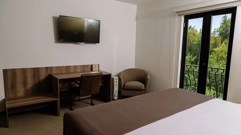 Imagen de la habitación del Hotel Villa Del Carmen. Foto 8