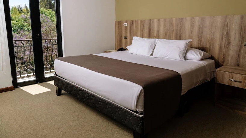 Imagen de la habitación del Hotel Villa Del Carmen. Foto 13