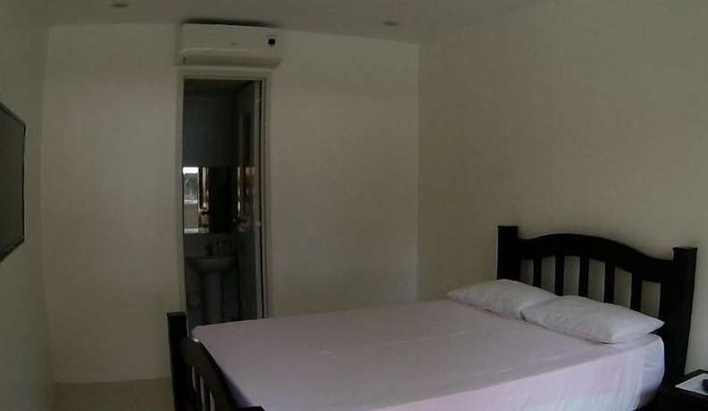 Imagen de la habitación del Hotel Villa Del Faro. Foto 10