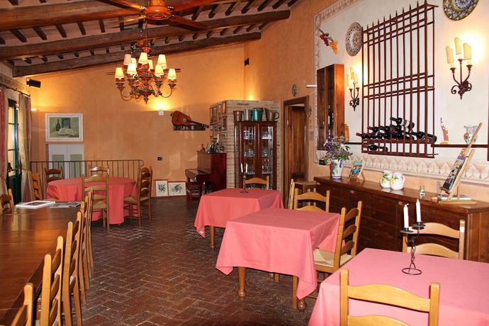 Imagen del bar/restaurante del Hotel Villa Delia and Cooking School. Foto 4