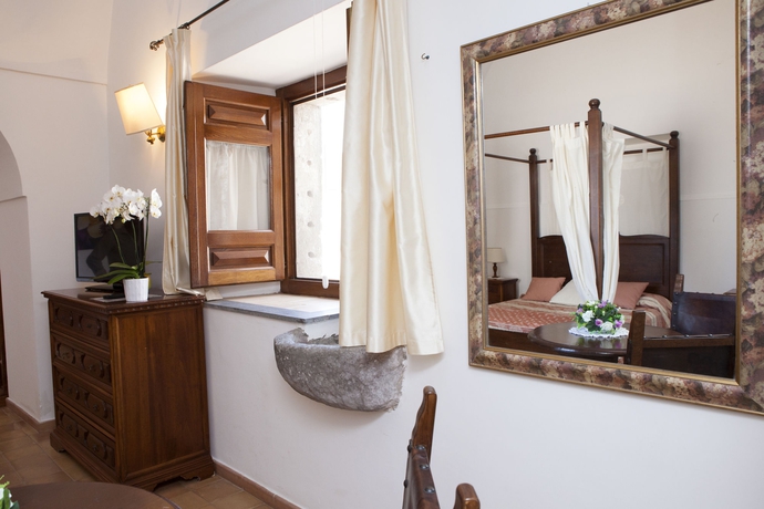 Imagen de la habitación del Hotel Villa Della Porta. Foto 6