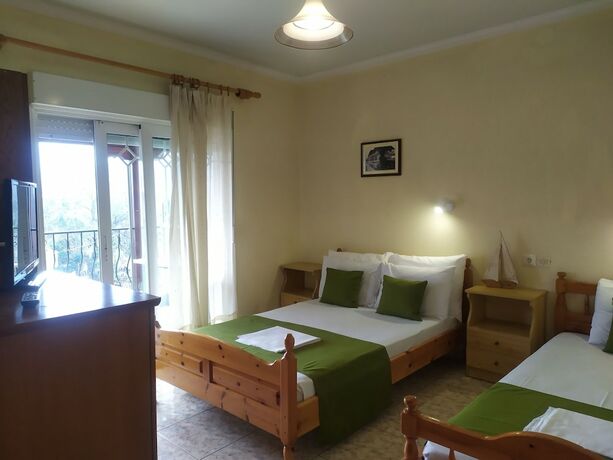 Imagen de la habitación del Hotel Villa Dimitris. Foto 19