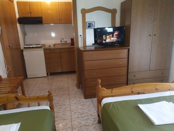 Imagen de la habitación del Hotel Villa Dimitris. Foto 20