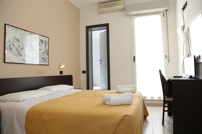 Imagen de la habitación del Hotel Villa Dina. Foto 16