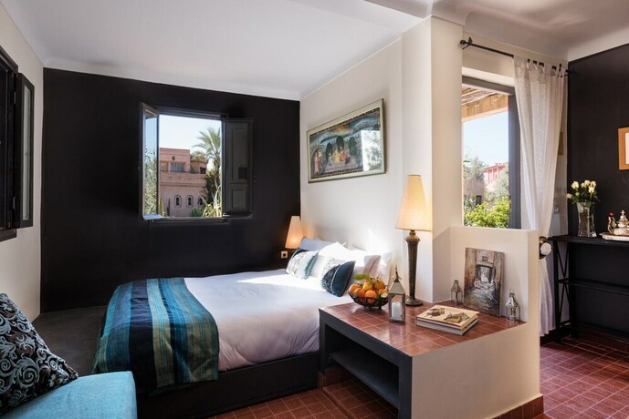 Imagen de la habitación del Hotel Villa Dinari. Foto 19