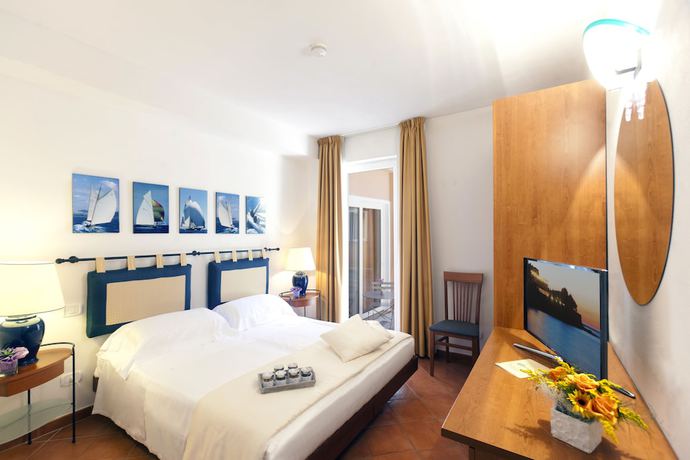 Imagen de la habitación del Hotel Villa Domizia. Foto 13