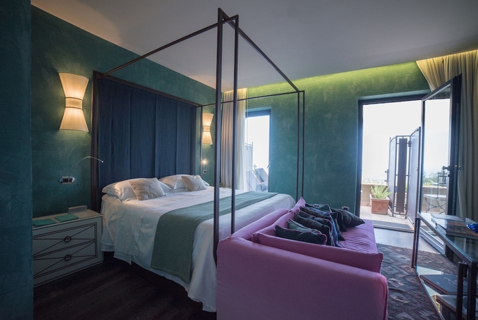 Imagen de la habitación del Hotel Villa Ducale. Foto 3