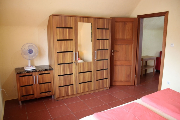 Imagen de la habitación del Hotel Villa Durian. Foto 6