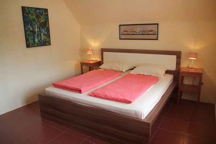 Imagen de la habitación del Hotel Villa Durian. Foto 7