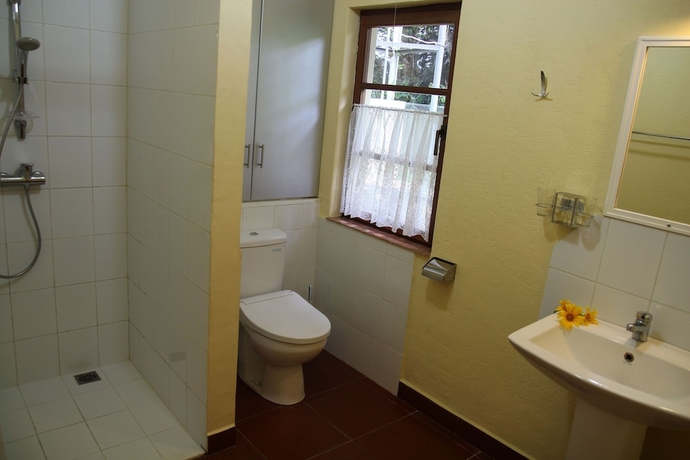 Imagen de la habitación del Hotel Villa Durian. Foto 15