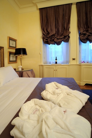 Imagen de la habitación del Hotel Villa Duse. Foto 14