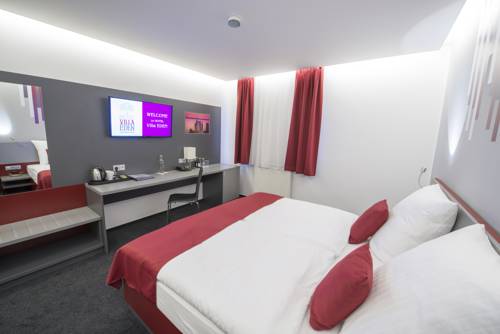 Imagen de la habitación del Hotel Villa Eden. Foto 2