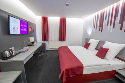 Imagen de la habitación del Hotel Villa Eden. Foto 6