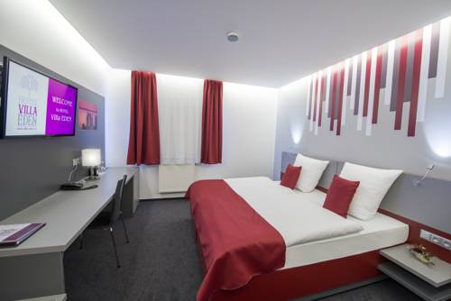 Imagen de la habitación del Hotel Villa Eden. Foto 8