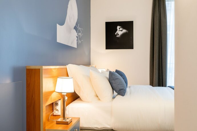 Imagen de la habitación del Hotel Villa Eiffel Mademoiselle. Foto 15