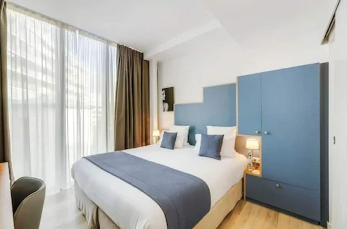 Imagen de la habitación del Hotel Villa Eiffel Mademoiselle. Foto 17