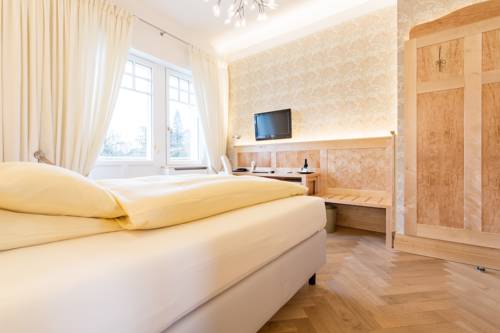 Imagen de la habitación del Hotel Villa Elben. Foto 5