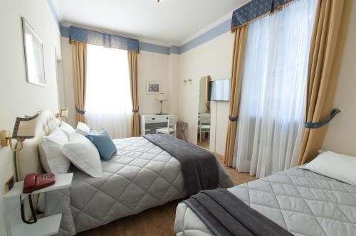 Imagen de la habitación del Hotel Villa Erica. Foto 8