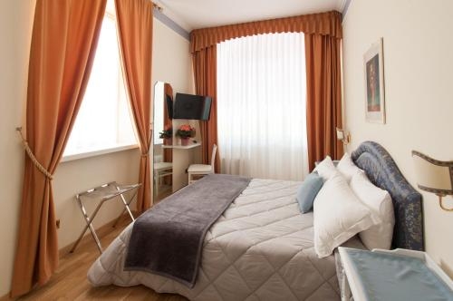 Imagen de la habitación del Hotel Villa Erica. Foto 9