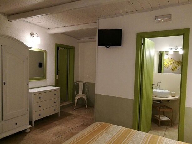 Imagen de la habitación del Hotel Villa Felicia. Foto 28