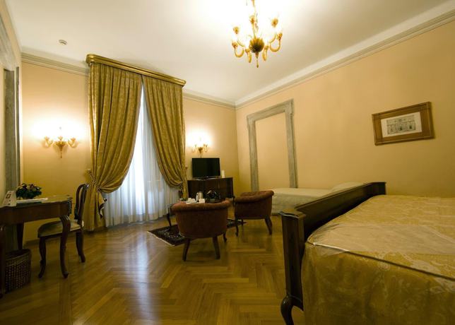 Imagen de la habitación del Hotel Villa Fenaroli Palace. Foto 19